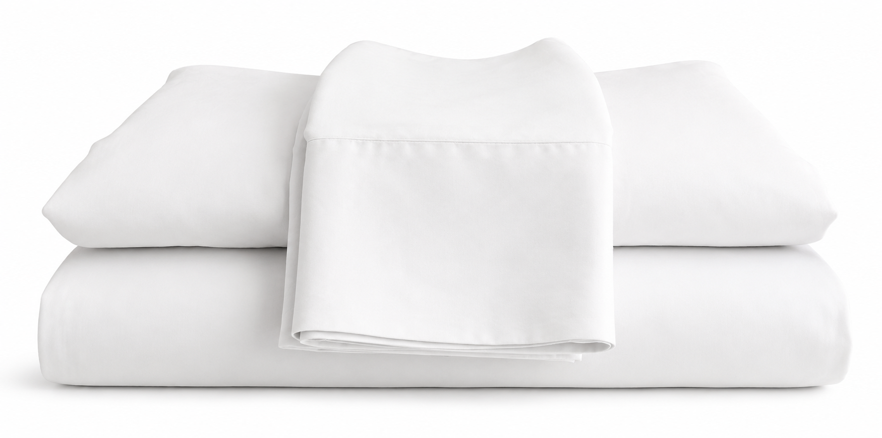 White bed sheets and pillowcases set on a white background