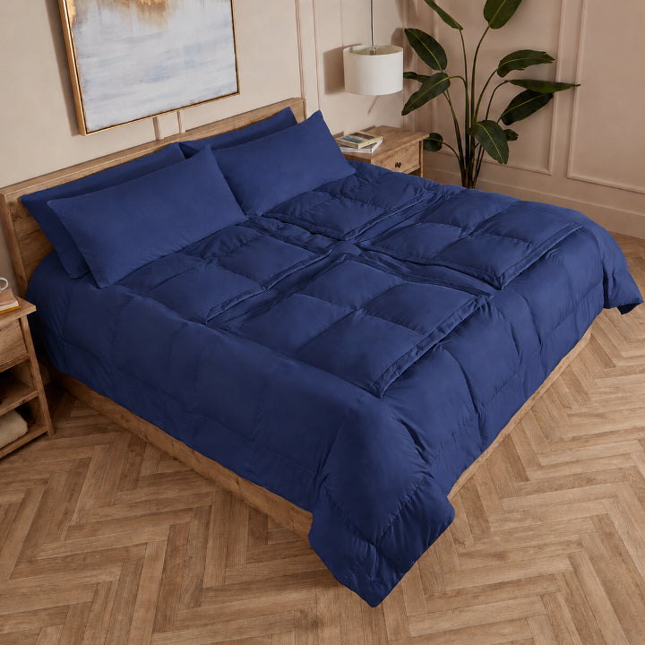 Navy Sleeping Dove cooling comforter in a bedroom setting