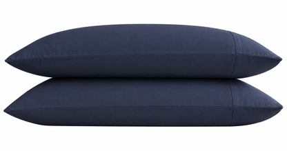 Two navy blue pillows on a white background