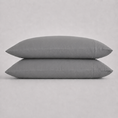 Two rectangular slate pillows stacked horizontally against a light gray background.