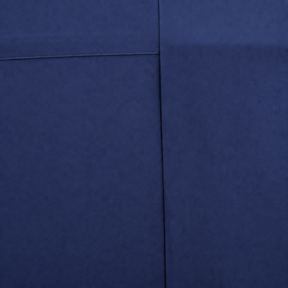 A close-up of a Navy fabric surface with visible texture and a seam dividing the frame into two sections.