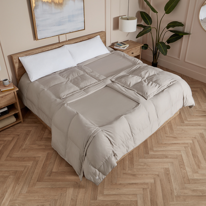 Natural cooling cotton comforter with some fabric windows open and some closed, perfect for hot sleepers, couples, pregnancy, menopause, pet owners, and foot relief. This is the Sleeping Dove Comforter, the natural cooling comforter.
