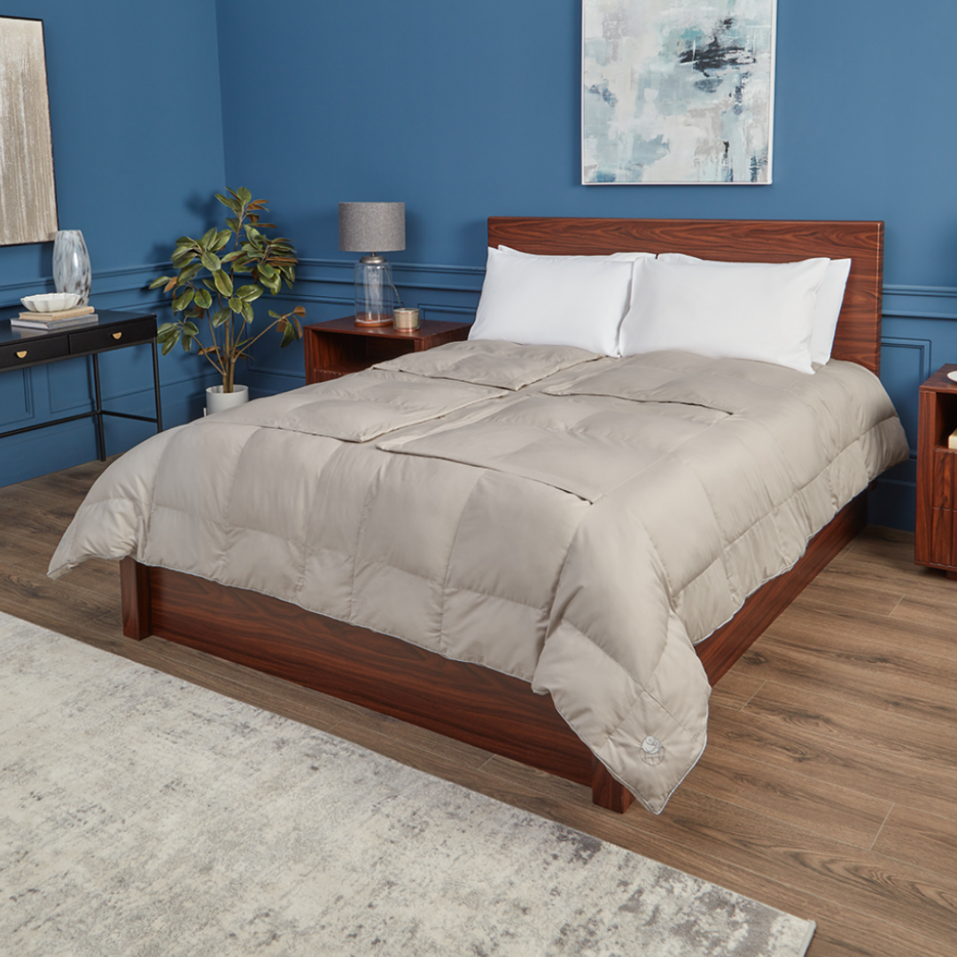 Natural cooling cotton comforter with fabric windows, perfect for hot sleepers, couples, pregnancy, menopause, pet owners, and foot relief. This is the Sleeping Dove Comforter, the natural cooling comforter.