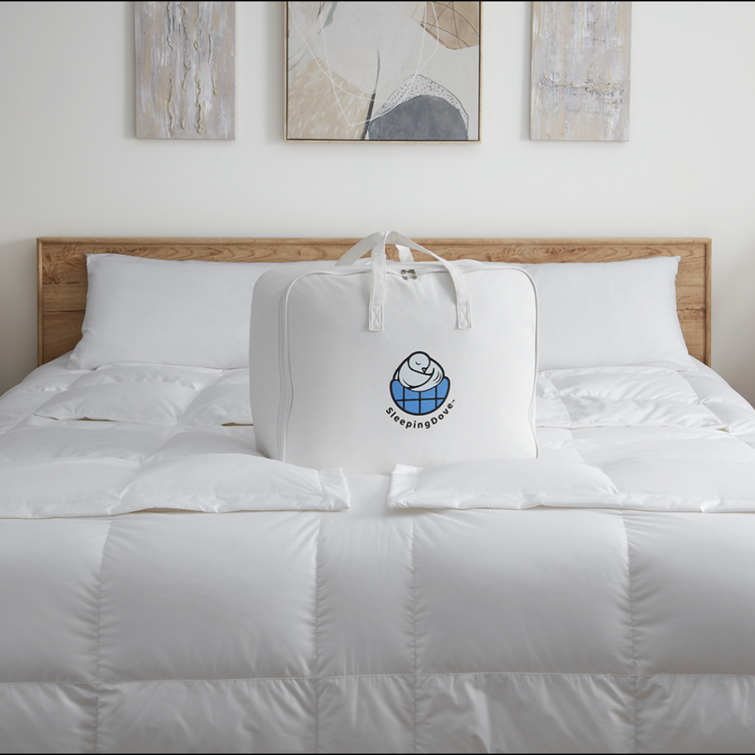 Sleeping Dove cooling comforter in eco-friendly cotton bag, ideal for hot sleepers, couples, pregnancy, menopause, and pet owners. This is the Sleeping Dove Comforter, the natural cooling comforter.